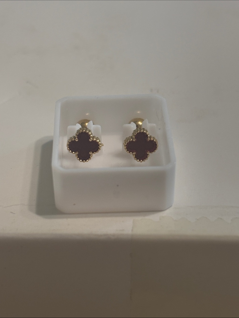 Gold Four-Leaf Clover Stud Earrings with burgundy Inlay